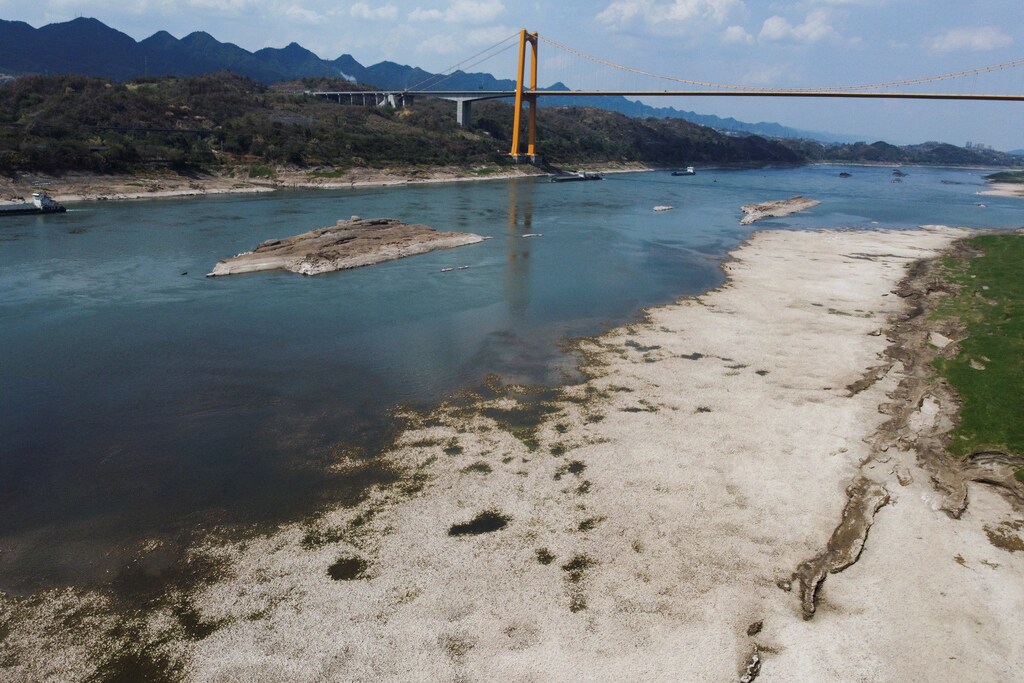 A panoramic view of the Yangtze river approaching record-low water levels during a regional drought in Chongqing, China.