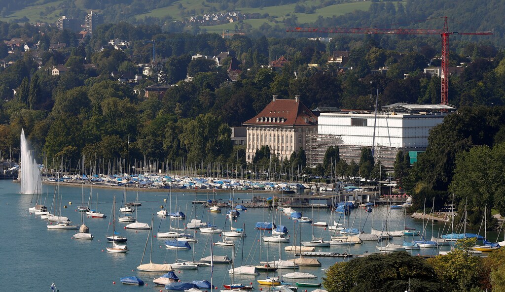 A general view shows the headquarters and the construction site of Swiss insurer Swiss Re's new office building on the banks of Lake Zurich in Zurich, Switzerland August 25, 2016 REUTERS/Arnd Wiegmann - RTX2N6ZL