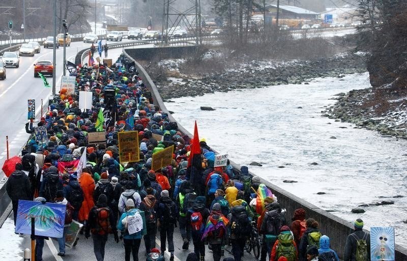 Climate activists take part in a march to highlight issues surrounding climate change at the World Economic Forum Davos (WEF), through the Chlus gorge along the Landquart river near Landquart, Switzerland January 19, 2020. REUTERS/Arnd Wiegmann - RC23JE97M6YM