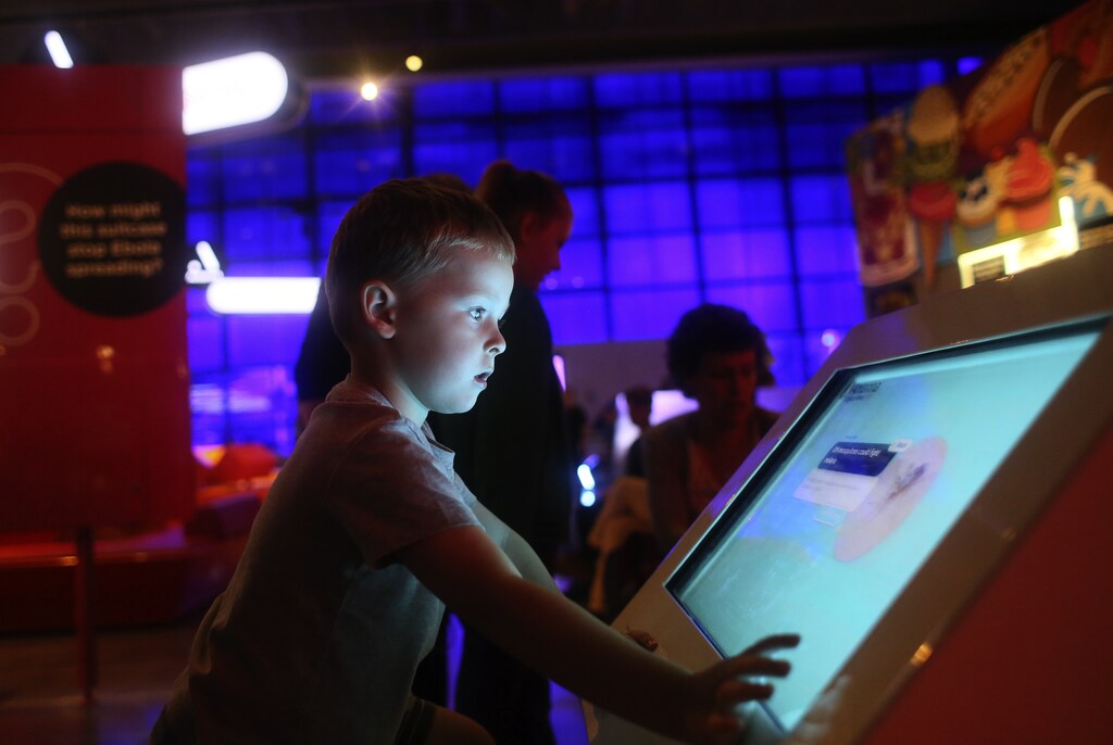 Alfie Latimer (4) from Dubai looks at an exhibit in the Science Museum, London August 4, 2015.