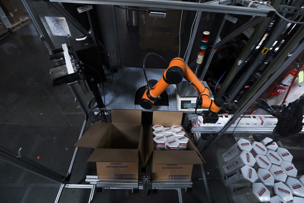 A Rapid Robotics robot is seen from above as it moves a product in a Westec Plastics Corp warehouse in Livermore, California, U.S.