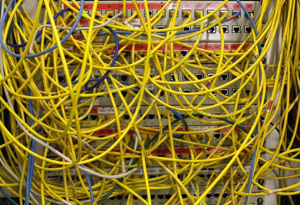 Ethernet cables used for internet connections are pictured in a Berlin office, August 20, 2014. The German cabinet discussed on Wednesday Germany's digital agenda for the future. REUTERS/Fabrizio Bensch (GERMANY - Tags: POLITICS) - RTR4329R