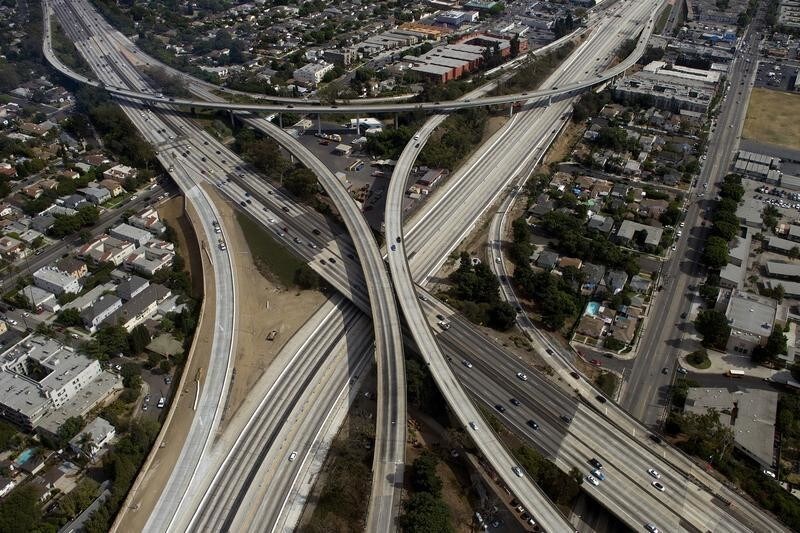 The empty 405 freeway looking southbound running underneath the 10 freeway is shown in this aerial photo in Los Angeles, California September 29, 2012. Drivers in Los Angeles saw limited congestion on Saturday near a key freeway corridor shut down this weekend in what has been dubbed "Carmageddon 2" due to fears of gridlock from a 53-hour construction project, officials said. REUTERS/Gina Ferazzi /POOL