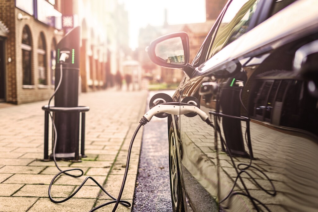Electric vehicle is changing in street helping the green transition
