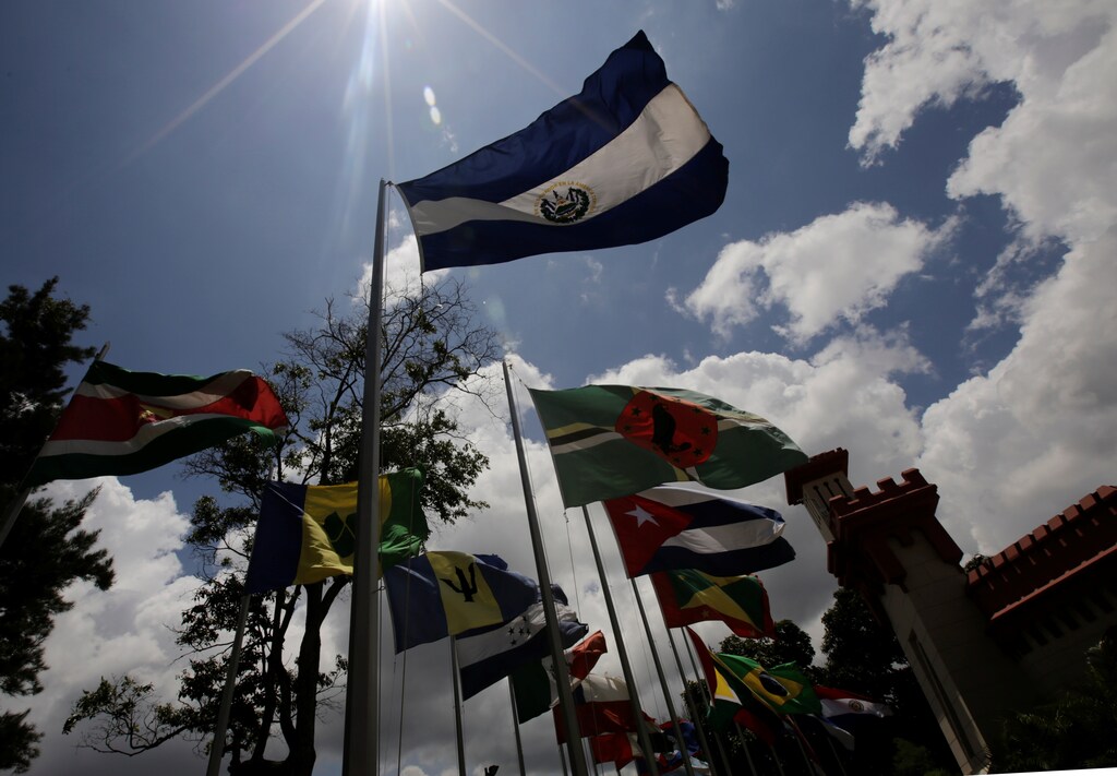Flags of CELAC states (Community of Latin American and Caribbean States) are pictured outside the mausoleum of late President Hugo Chavez at the 4F military fort in Caracas, Venezuela September 10, 2016. REUTERS/Henry Romero - RTSN6N2