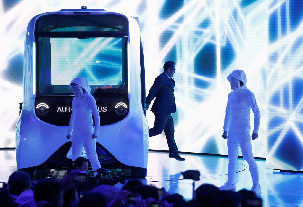Toyota Motor Corporation President Akio Toyoda gets out of an e-Palette autonomous concept vehicle at the Tokyo Motor Show, in Tokyo, Japan October 23, 2019. REUTERS/Edgar Su