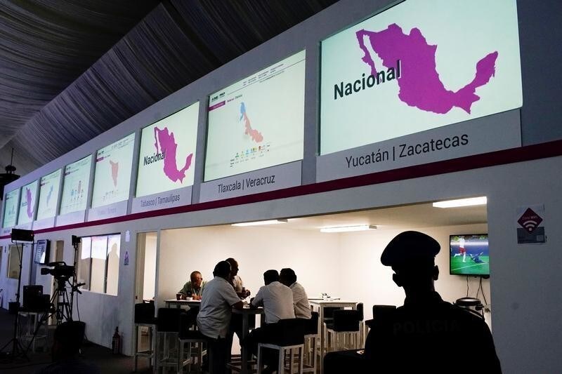 Screens displaying partial results of Mexico's elections are seen at the National Electoral Institute (INE) in Mexico City, Mexico, July 2, 2018.