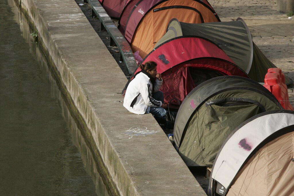 Tents for homeless people line the Canal Saint Martin in Paris, February 20, 2007. The French association "Enfants de Don Quichotte" (Children of Don Quichotte) set up the tents on December 17, 2006 to draw attention to the need for long-term accommodation solutions for the city's homeless. REUTERS/Benoit Tessier (FRANCE)