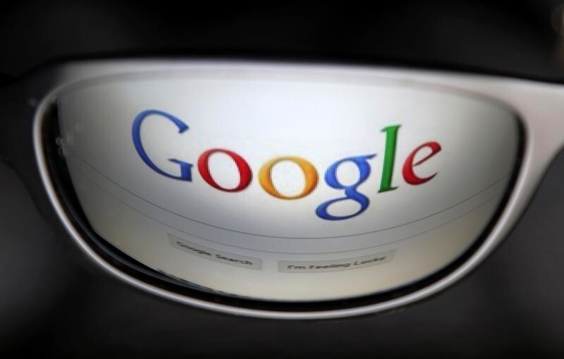 A Google search page is reflected in sunglasses in this photo illustration taken in Brussels May 30, 2014. REUTERS/Francois Lenoir/File Photo GLOBAL BUSINESS WEEK AHEAD PACKAGE - SEARCH 'BUSINESS WEEK AHEAD 24 OCT' FOR ALL IMAGES - RTX2Q587