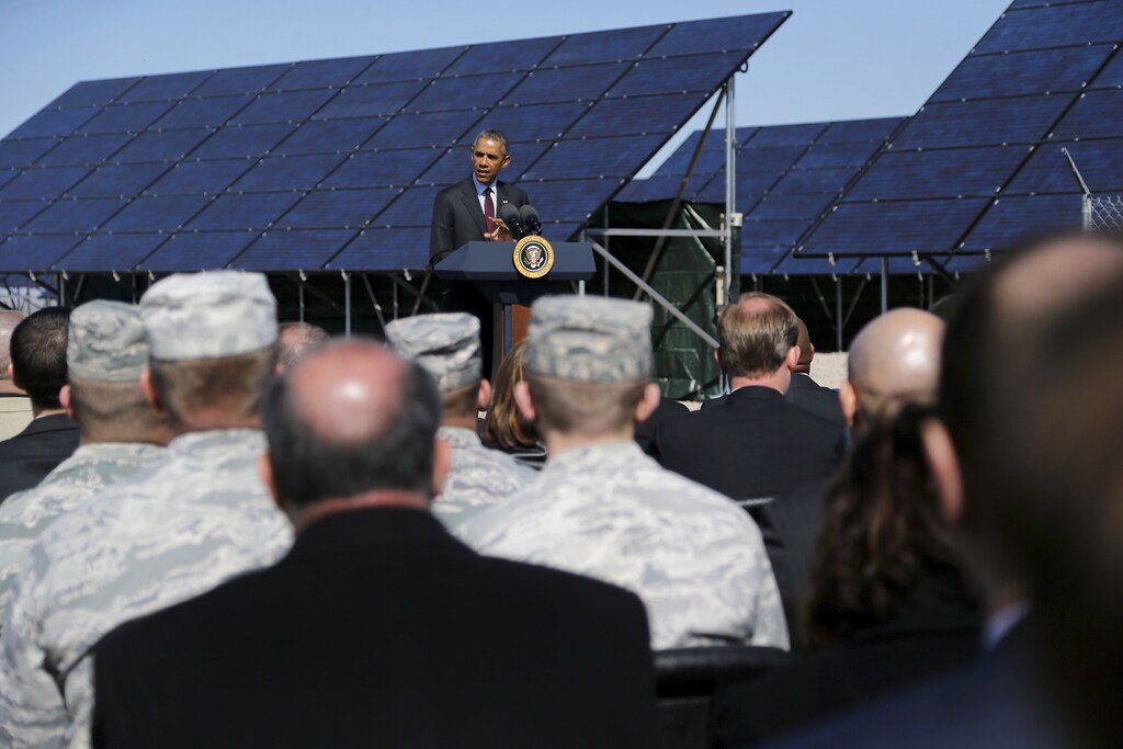 U.S. President Barack Obama delivers remarks on clean energy after a tour of a solar power array at Hill Air Force Base, Utah April 3, 2015. Obama announced a Department of Energy initiative Friday with the goal of training 75,000 workers, especially targeting veterans, to enter the solar energy workforce by the year 2020.REUTERS/Jonathan Ernst - RTR4W1Y6