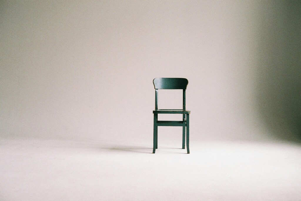 An empty chair in an empty room. future thinking