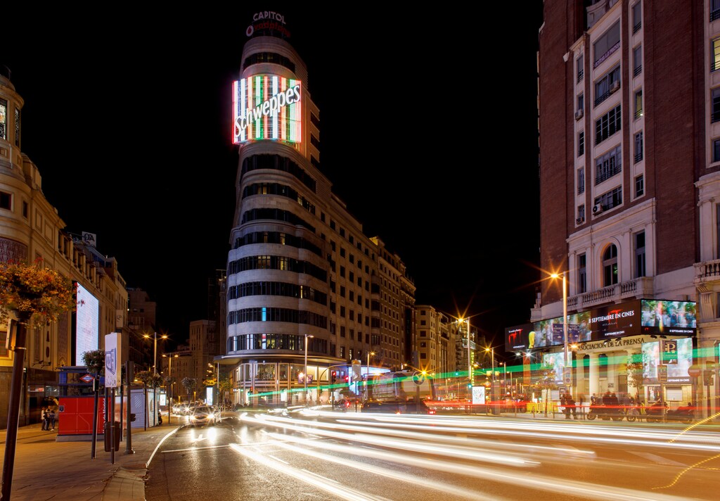 Lights from vehicles are seen on one of the busiest streets, the Gran Via, in Madrid, Spain, September 16, 2017. REUTERS/Paul Hanna - RC133ED73580