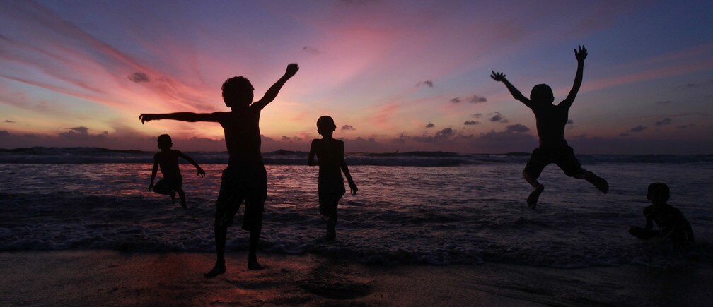 Children play at the Mount Lavinia beach in Colombo October 2 , 2011.