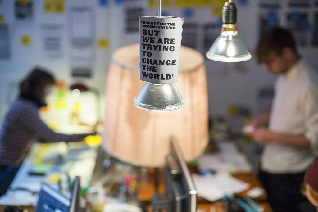 Emma Rose of Britain (L) and Nils Westerlund of Sweden work in the office of the HowDo, a "how-to-do-it-yourself" app, start-up at the Wostel co-working space in Berlin March 18, 2013. Europe must urgently tackle youth unemployment, the French, German and Italian governments said May 28, 2013, urging action to rescue an entire generation who fear they will not find jobs. Some 7.5 million Europeans aged 15-24 are neither in employment nor in education or training, according to EU data. Youth unemployment in the EU stood at 23.6 percent in January, more than twice as high as the adult rate. Picture taken March 18, 2013. REUTERS/Thomas Peter (GERMANY - Tags: BUSINESS EMPLOYMENT) - RTX103SC