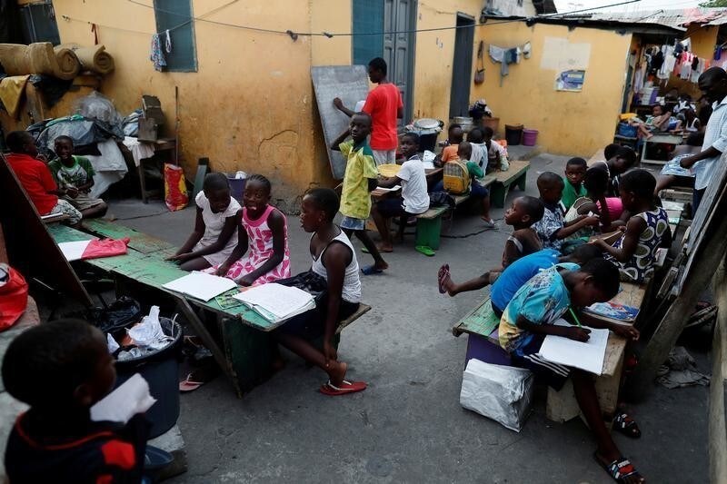 Children attend the evening class in Jamestown, Accra, Ghana November 28, 2018. REUTERS/Zohra Bensemra TPX IMAGES OF THE DAY - RC1F5285FB00