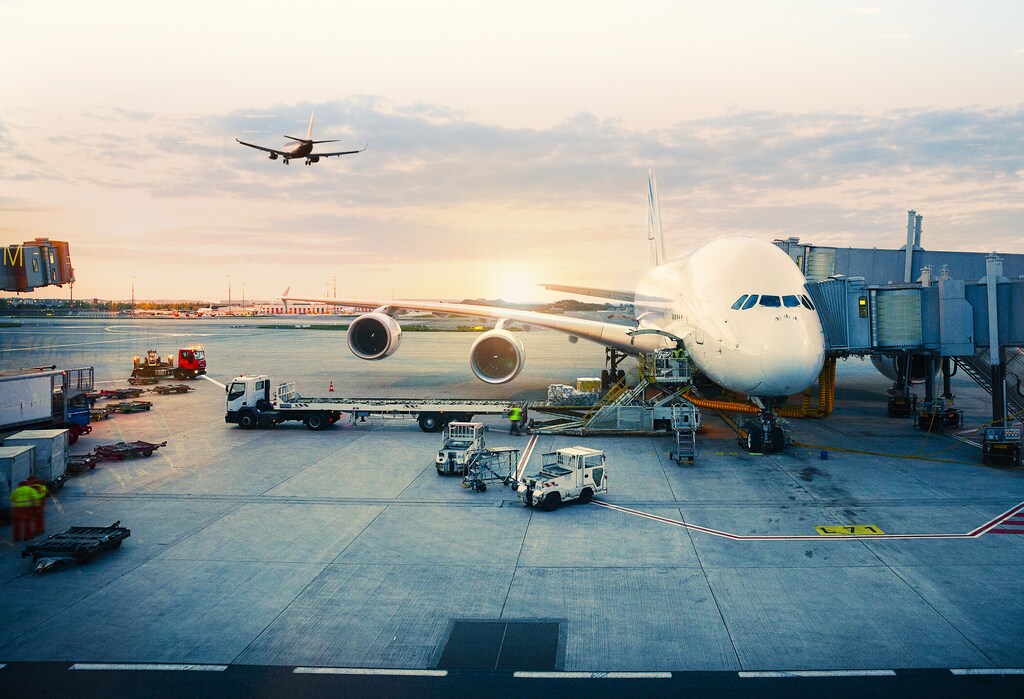 View of airplane at the airport at sunrise. Paris, France: Availability and cost of sustainable aviation fuel remain a challenge