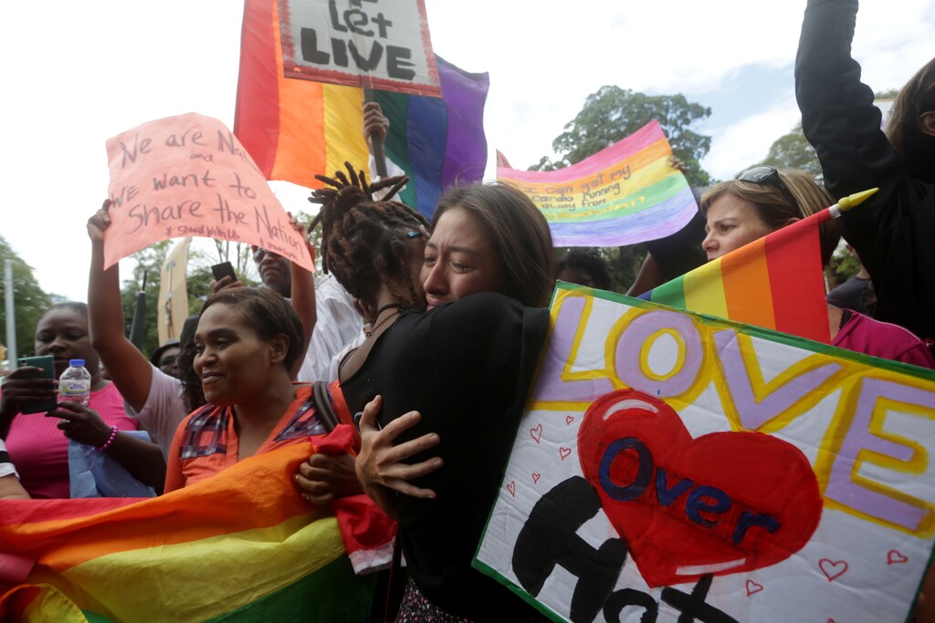 Members of the LGBT community demonstrate outside the Hall of Justice in Port-of-Spain, Trinidad and Tobago April 12, 2018. REUTERS/Andrea de Silva - RC1701B8E570