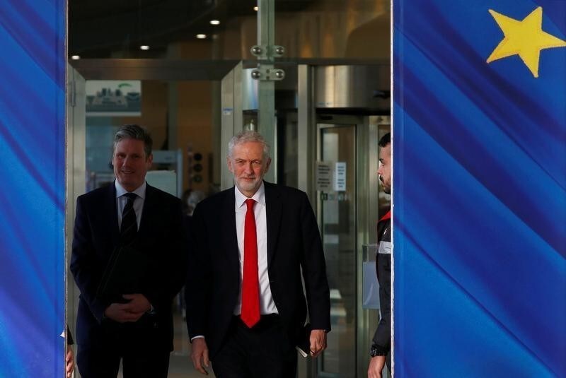 Britain's Labour Party leader Jeremy Corbyn and Labour Party's Shadow Secretary of State for Departing the European Union Keir Starmer leave a meeting with European Union Chief Brexit Negotiator Michel Barnier (not pictured) at the EU Commission headquarters in Brussels, Belgium, February 21, 2019. REUTERS/Francois Lenoir - RC1EA3E44590
