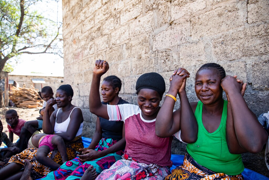 Women in Misisi Compound, Luskaka Zambia express happiness: Mental health in Africa is vastly under-prioritized.