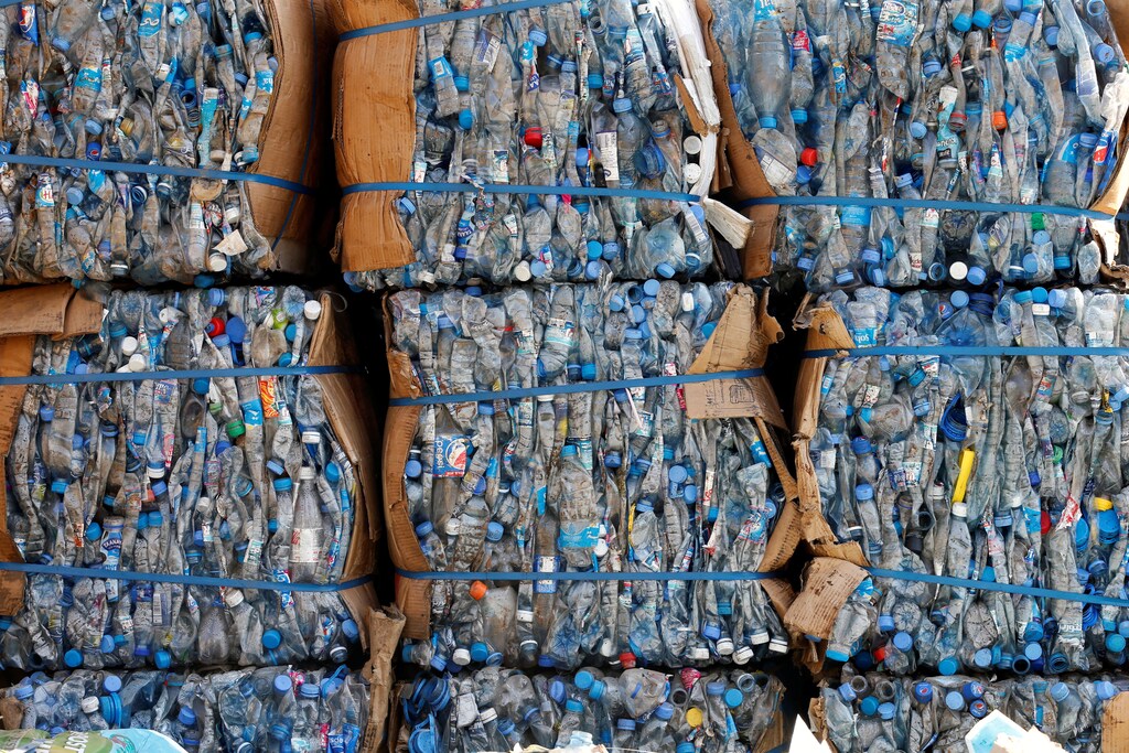 Plastic bottles are sorted to be recycled at Cedar Environmental waste management company in Beit Mery, Lebanon August 17, 2017. REUTERS/Mohamed Azakir - RC1DF3599AF0