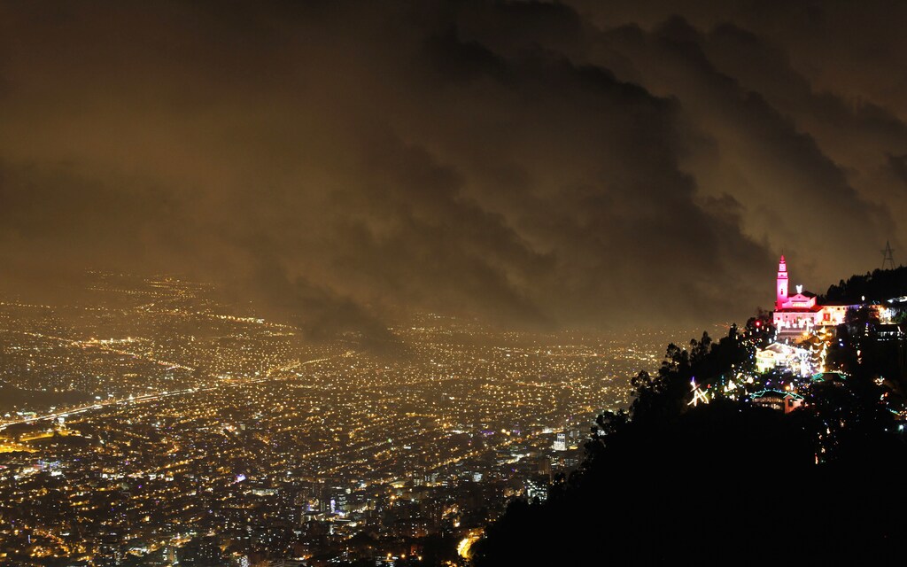 General view of illuminated Christmas decorations at Monserrate church in Bogota December 19, 2011. REUTERS/John Vizcaino (COLOMBIA - Tags: SOCIETY CITYSPACE RELIGION TPX IMAGES OF THE DAY) - GM1E7CK102C01