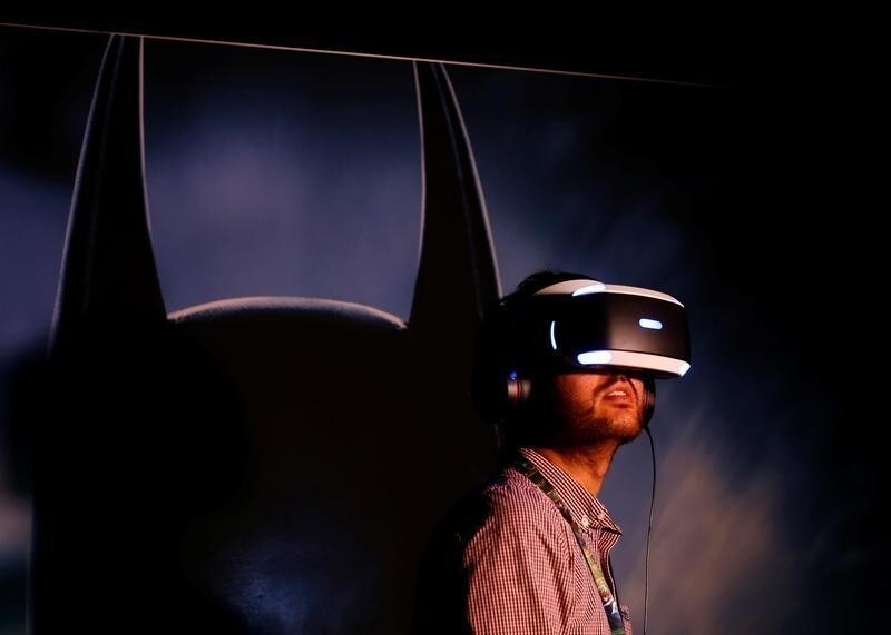 People try the new Sony VR headset during Sony Corporation's PlayStation 4 E3 2016 event.