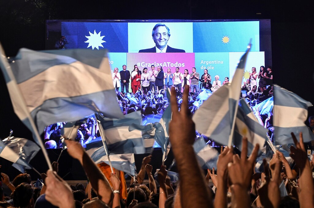 Supporters of Alberto Fernandez and his running mate and former President Cristina Fernandez de Kirchner, celebrate after Alberto Fernandez wins the general election, in Buenos Aires, Argentina October 27, 2019. Picture taken October 27, 2019. REUTERS/Magali Druscovich - RC176A437A10