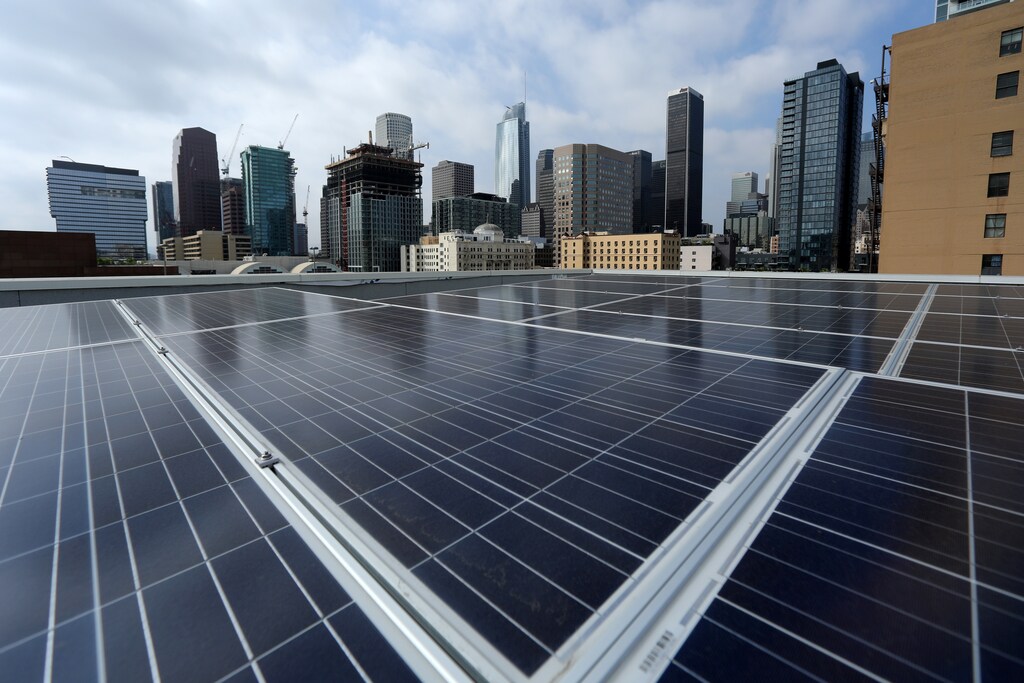 Solar electric panels are shown installed on the roof of the Hanover Olympic building, the first building to offer individual solar-powered net-zero apartments in Los Angeles, California, U.S., June 6, 2017.