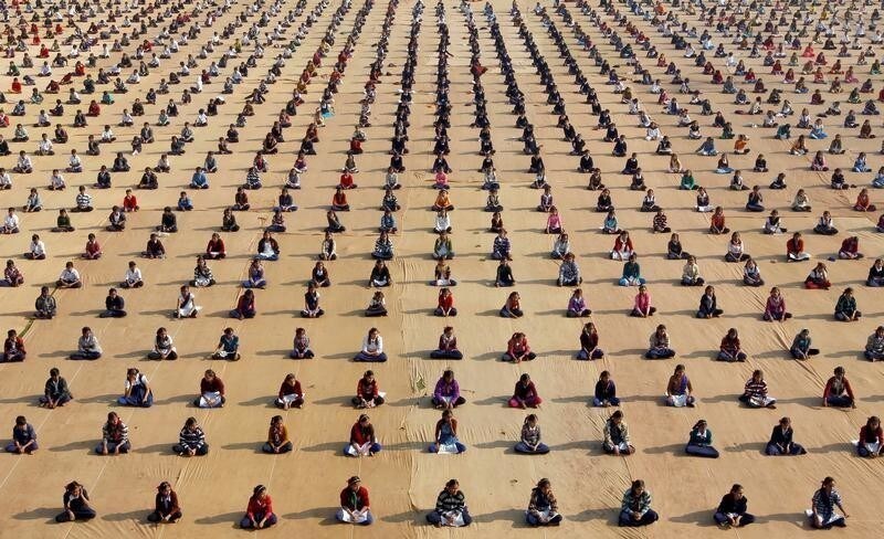 Schoolchildren attend a yoga session at a camp in Ahmedabad, India January 5, 2017. REUTERS/Amit Dave TPX IMAGES OF THE DAY - RC18C3563B90