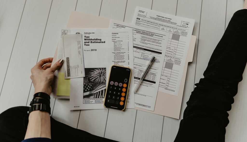 Person calculating finances.
