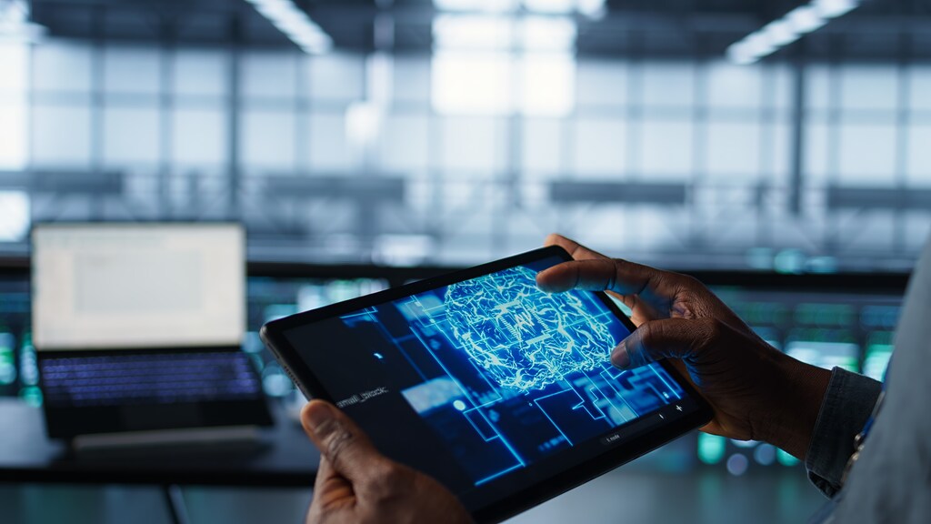 Programmer in data centre using AI tech on tablet, testing equipment failover scenarios. Server farm IT specialist uses artificial intelligence on device, ensuring data accessibility, camera B closeup: AI governance pillars strengthens customer confidence, regulatory readiness and long-term competitiveness