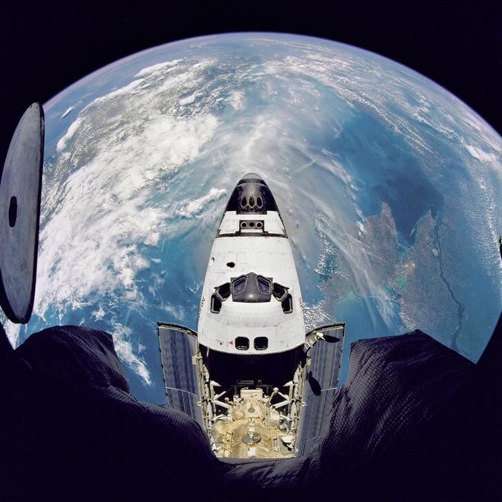 Fish-eye view of the Space Shuttle Atlantis in orbit as seen from the Russian Mir space station during the STS-71 mission on June 29, 1995. REUTERS/NASA/Kennedy Space Center/Handout (UNITED STATES - Tags: SCI TECH IMAGES OF THE DAY) FOR EDITORIAL USE ONLY. NOT FOR SALE FOR MARKETING OR ADVERTISING CAMPAIGNS. THIS IMAGE HAS BEEN SUPPLIED BY A THIRD PARTY. IT IS DISTRIBUTED, EXACTLY AS RECEIVED BY REUTERS, AS A SERVICE TO CLIENTS