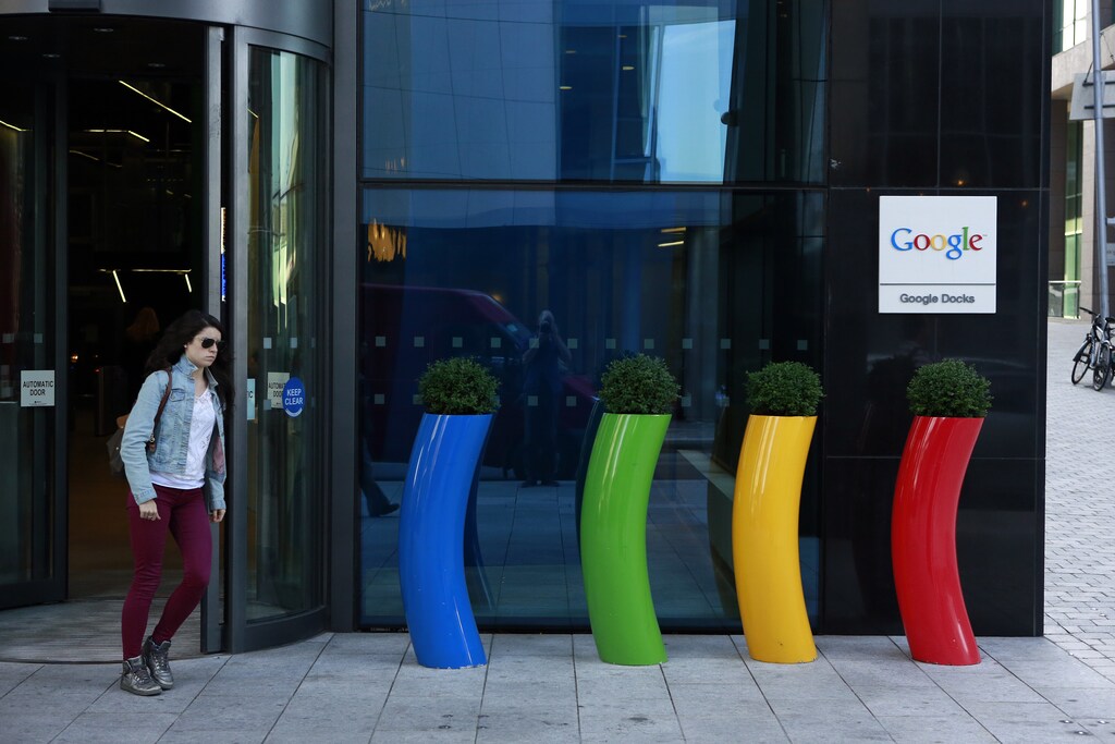 A woman walks past the Google offices near the city centre in Dublin July 8, 2013. The positive impact of international companies can be seen in the once derelict area of Dublin's docklands, now dubbed Silicon Docks, where Google and Facebook's offices sit next to the country's largest theatre, newest five-star hotel and modern apartment blocks Coronavirus china virus health healthcare who world health organization disease deaths pandemic epidemic worries concerns Health virus contagious contagion viruses diseases disease lab laboratory doctor health dr nurse medical medicine drugs vaccines vaccinations inoculations technology testing test medicinal biotechnology biotech biology chemistry physics microscope research influenza flu cold common cold bug risk symptomes respiratory china iran italy europe asia america south america north washing hands wash hands coughs sneezes spread spreading precaution precautions health warning covid 19 cov SARS 2019ncov wuhan sarscow wuhanpneumonia pneumonia outbreak patients unhealthy fatality mortality elderly old elder age serious death deathly deadly