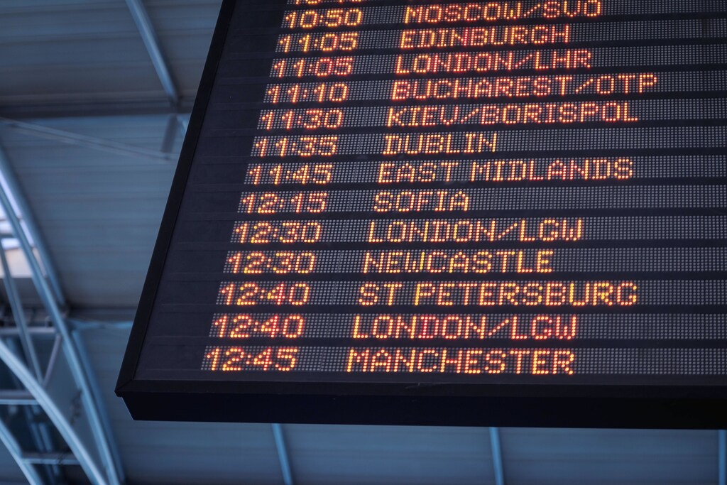 A board at the airport showing the schedule of flights