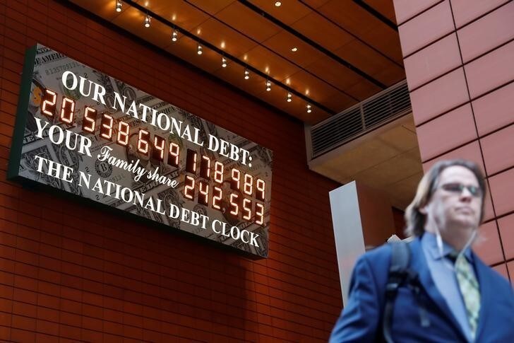 The National Debt Clock is seen in the Manhattan borough of New York City, New York, U.S., November 30, 2017. REUTERS/Shannon Stapleton