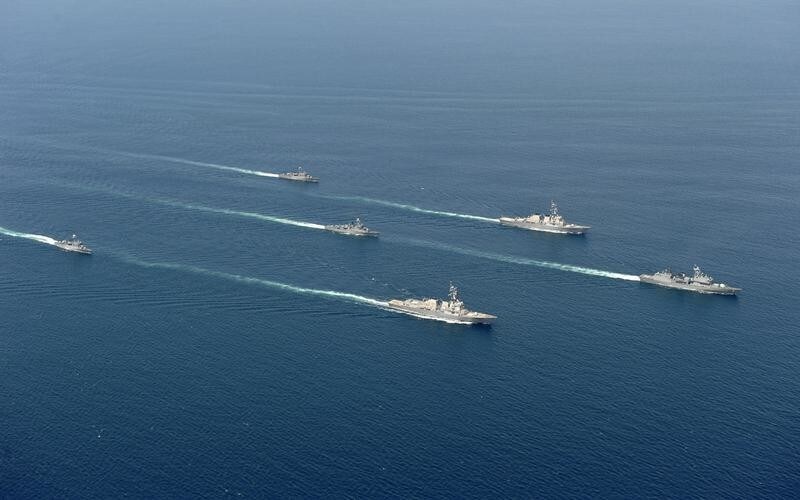 South Korean navy's warships and U.S. navy's Aegis destroyers (2nd R and 3rd R) take part in the joint military exercises between the U.S. and South Korea on the East Sea of South Korea July 27, 2010. REUTERS/South Korean Navy/Handout (SOUTH KOREA - Tags: MILITARY CONFLICT POLITICS) FOR EDITORIAL USE ONLY. NOT FOR SALE FOR MARKETING OR ADVERTISING CAMPAIGNS - RTR2GRGU