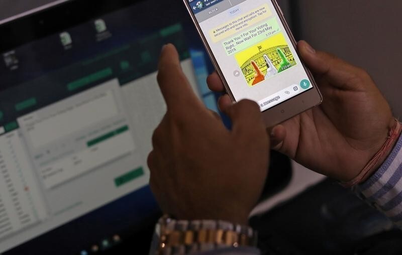 Rohitash Repswal, a digital marketer, checks a WhatsApp message that he sent using a software tool that appears to automate the process of sending messages to WhatsApp users, inside his office in New Delhi, India, May 8, 2019. Picture taken May 8, 2019. REUTERS/Anushree Fadnavis - RC17E8B82CB0