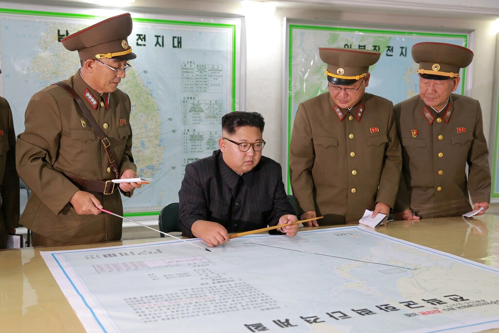 North Korean leader Kim Jong Un visits the Command of the Strategic Force of the Korean People's Army (KPA) in an unknown location in North Korea in this undated photo released by North Korea's Korean Central News Agency (KCNA) on August 15, 2017. KCNA/via REUTERS ATTENTION EDITORS - THIS PICTURE WAS PROVIDED BY A THIRD PARTY. NO THIRD PARTY SALES. SOUTH KOREA OUT. NO COMMERCIAL OR EDITORIAL SALES IN SOUTH KOREA. PICTURE BLURRED AT SOURCE. - RC174A56D0D0