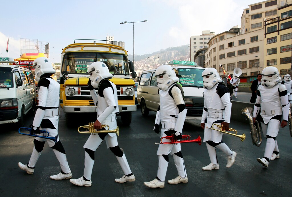 Members of a school band wearing Star Wars costumes walk in the center of La Paz, Bolivia, September 19, 2016. REUTERS/David Mercado TPX IMAGES OF THE DAY - RTSOHL6