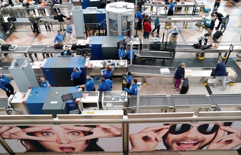 TSA Security personnel wait for passengers at Denver International Airport outside Denver, Colorado U.S. on November 3, 2017. Picture taken on November 3, 2017. REUTERS/Rick Wilking - RC11B2C474A0