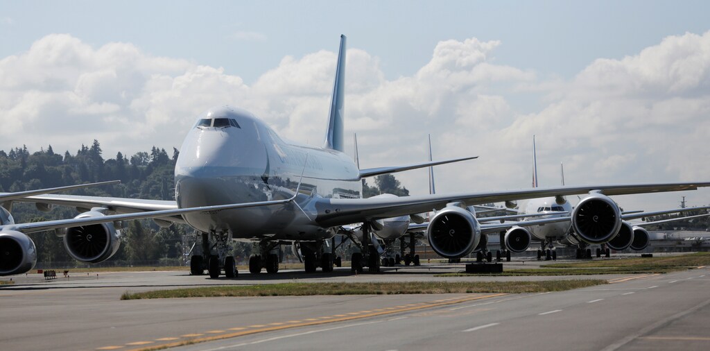 A 747 and other Boeing 7-Series jets are pictured on the runway during an event marking the centennial of The Boeing Company in Seattle, Washington July 15, 2016. REUTERS/Jason Redmond