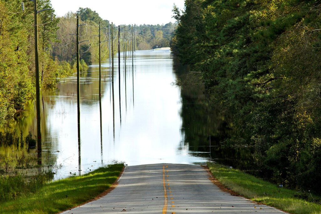 About a mile of flood waters obscure a highway and bridge over the Black River in the aftermath of Hurricane Florence, now downgraded to a tropical depression, near Atkinson, North Carolina, U.S., September 18, 2018. REUTERS/Jonathan Drake - RC179008C910