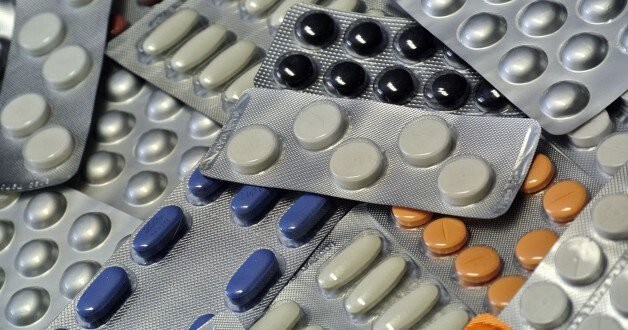 A series of drug packets are seen.