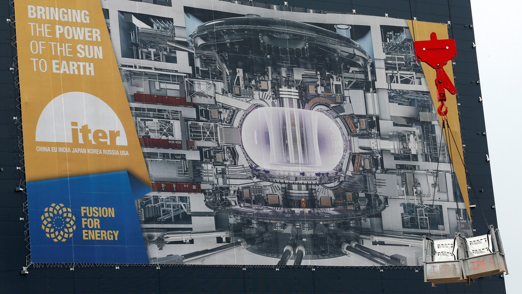 A crane loads equipment at the construction site of the International Thermonuclear Experimental Reactor (ITER) in Saint-Paul-lez-Durance,Southern France, October 6, 2016. REUTERS/Jean-Paul Pelissier