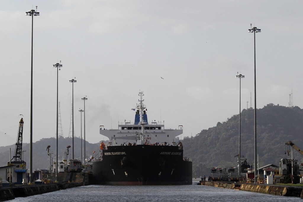 A cargo ship is seen at the Miraflores locks in Panama City December 31, 2014. Panama canal celebrates 15th years from when the U.S gave control of the canal to Panama. Officially, on 31st December 1999, the Panama Canal became the possession of the nation of Panama, ending nearly a century of American jurisdiction over one of the world's most strategic waterways. REUTERS/Carlos Jasso (PANAMA - Tags: SOCIETY MARITIME BUSINESS ANNIVERSARY) - RTR4JRYY