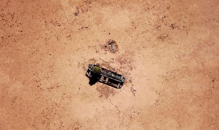 An old Sydney tram sits in a drought-effected paddock on Jimmie and May McKeown's property located on the outskirts of the town of Walgett, in New South Wales, Australia, July 20, 2018. REUTERS/David Gray SEARCH "AUSTRALIA DROUGHT" FOR THIS STORY. SEARCH "WIDER IMAGE" FOR ALL STORIES.