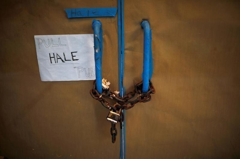 A closed business shop is seen at a touristic area of Condado, a year after Hurricane Maria devastated Puerto Rico, in San Juan, Puerto Rico September 19, 2018. Picture taken September 19, 2018. REUTERS/Carlos Barria - RC1826B9AF20