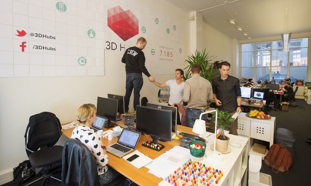 Workers are seen at the 3D Hubs office in Amsterdam September 2, 2014. In a continent where one in five young people are out of work, governments are pumping more and more cash into startups in the hope they can goose economic growth. Exact numbers are hard to determine, but according to AngelList, a website for new companies, there are now more than 4,700 startups in Europe, compared with nearly 14,000 in the United States. Picture taken September 2, 2014. To match Insight EUROPE-STARTUPS/MAKERS REUTERS/Toussaint Kluiters/United Photos (NETHERLANDS - Tags: BUSINESS SCIENCE TECHNOLOGY) - RTR4690V