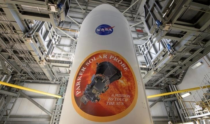 The United Launch Alliance Delta IV Heavy rocket payload fairing is seen with the NASA and Parker Solar Probe emblems, at Launch Complex 37, Cape Canaveral Air Force Station, Florida, U.S., August 8, 2018. Parker Solar Probe will travel through the Suns atmosphere, closer to the surface than any spacecraft before it. Courtesy Bill Ingalls/NASA/Handout via REUTERS ATTENTION EDITORS - THIS IMAGE HAS BEEN SUPPLIED BY A THIRD PARTY. MANDATORY CREDIT.