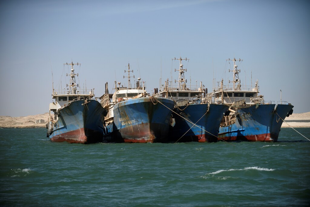Chinese fishing vessels are seen moored off the coast of Nouadhibou, Mauritania, April 14, 2018. Picture taken April 14, 2018. To match Special Report OCEANS-TIDE/SARDINELLA REUTERS/Sylvain Cherkaoui - RC1313283590
